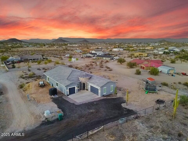 bird's eye view with a mountain view and view of desert