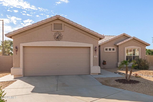 single story home with a garage