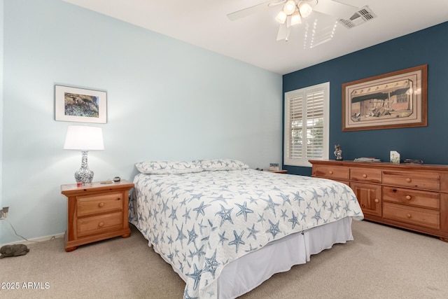 bedroom featuring ceiling fan and light colored carpet