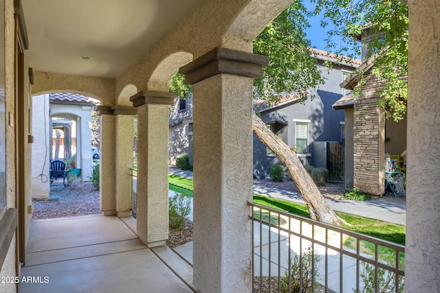 view of patio with a balcony