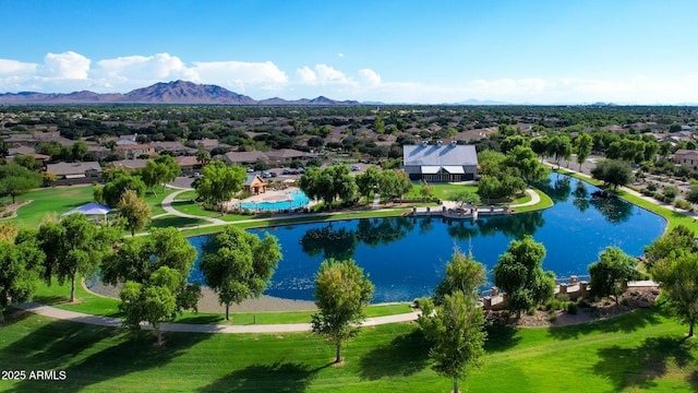 aerial view featuring a water and mountain view