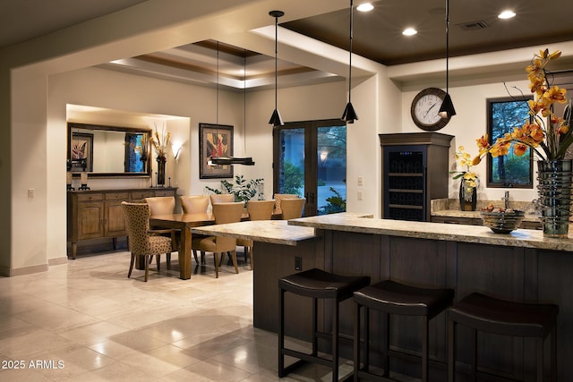 10205 E Happy Valley Rd, Scottsdale, AZ 85255 - bar area with a raised ceiling, recessed lighting, decorative light fixtures, and baseboards