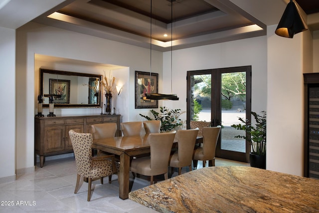 10205 E Happy Valley Rd, Scottsdale, AZ 85255 - dining room featuring a raised ceiling, a towering ceiling, and light tile patterned flooring