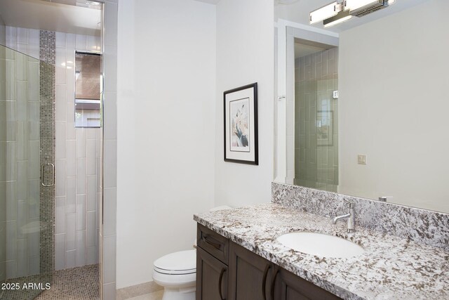 10205 E Happy Valley Rd, Scottsdale, AZ 85255 - full bath with a stall shower, toilet, vanity, and tile patterned flooring