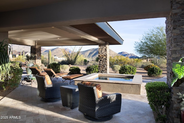 10205 E Happy Valley Rd, Scottsdale, AZ 85255 - view of patio with an in-ground hot tub and a mountain view