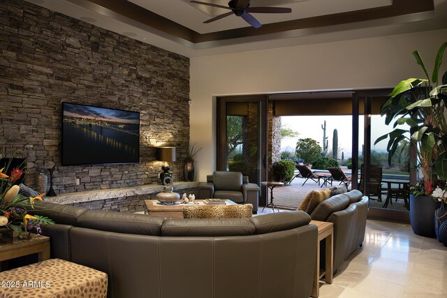 10205 E Happy Valley Rd, Scottsdale, AZ 85255 - living area featuring a ceiling fan and a tray ceiling