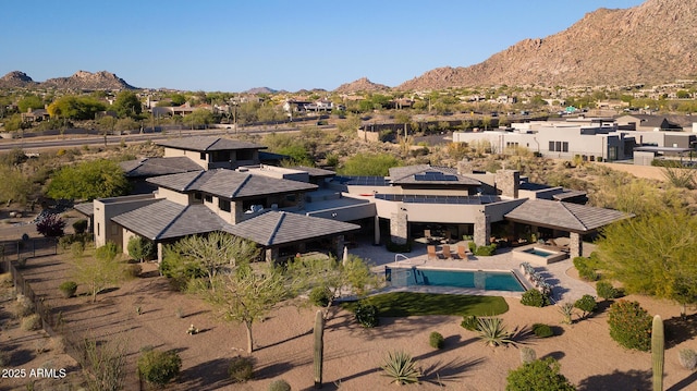 10205 E Happy Valley Rd, Scottsdale, AZ 85255 - aerial perspective of suburban area with a mountainous background and a pool