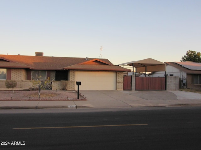 single story home featuring a garage