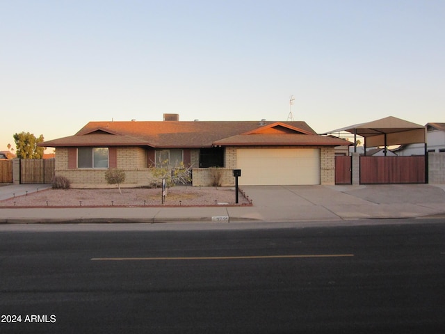 ranch-style home featuring a garage