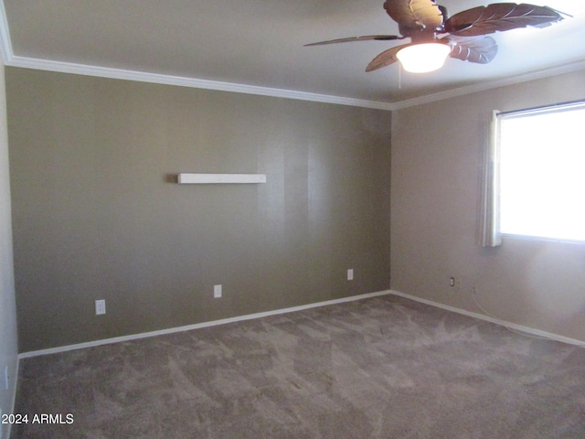 carpeted empty room featuring ceiling fan and ornamental molding