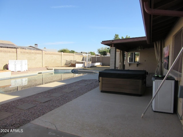 view of patio featuring a fenced in pool