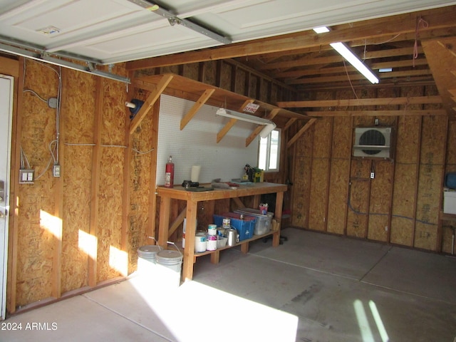 garage featuring a workshop area