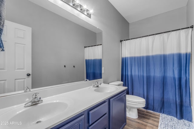 1405 S Honeysuckle Cir, Gilbert, AZ 85296 - full bath featuring toilet, double vanity, and wood finished floors