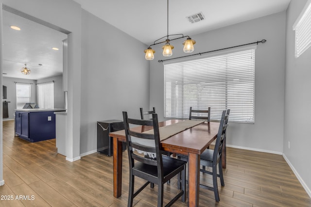 1405 S Honeysuckle Cir, Gilbert, AZ 85296 - dining room featuring wood finished floors, baseboards, and recessed lighting