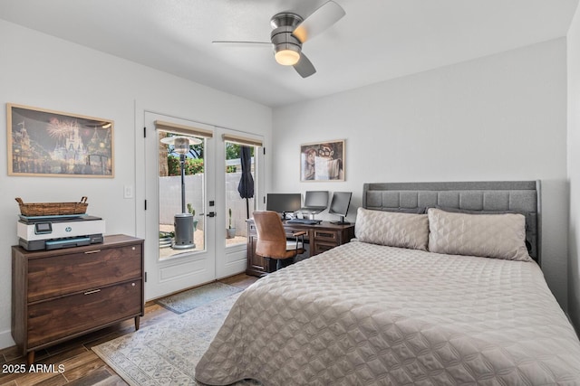bedroom with wood finished floors, ceiling fan, and access to outside