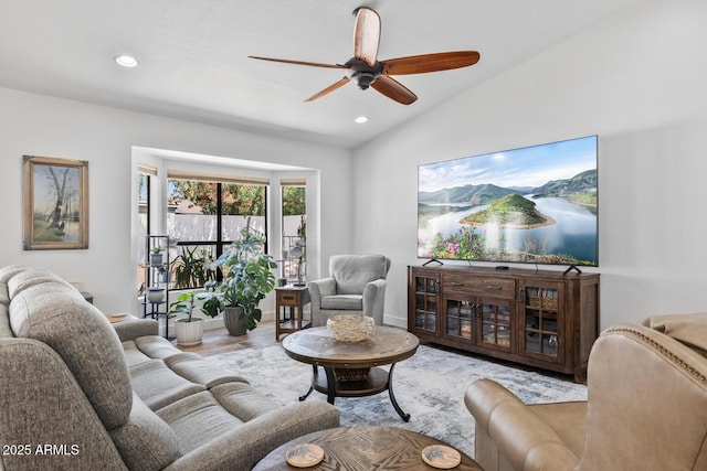 living room with recessed lighting, a ceiling fan, vaulted ceiling, and wood finished floors