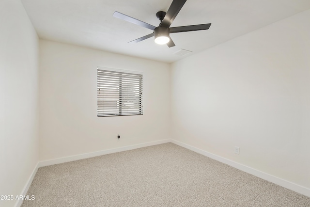 unfurnished room featuring visible vents, baseboards, and carpet flooring