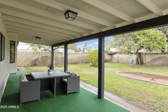 view of patio / terrace featuring outdoor dining space and a fenced backyard