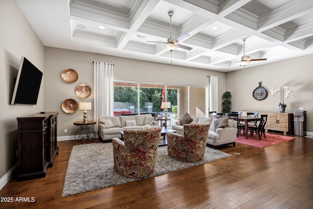 living room with coffered ceiling, dark hardwood / wood-style flooring, ceiling fan, beam ceiling, and a high ceiling