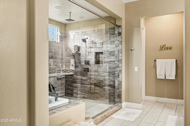 bathroom featuring shower with separate bathtub