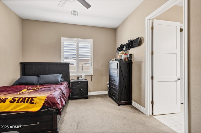 bedroom featuring ceiling fan and light colored carpet