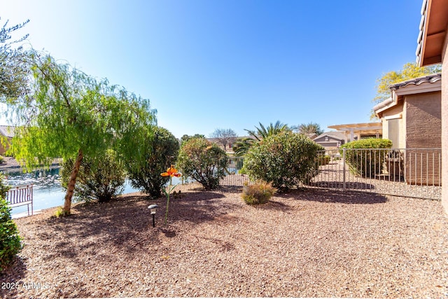 view of yard with a water view