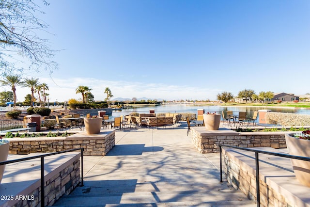 view of patio / terrace with a water view