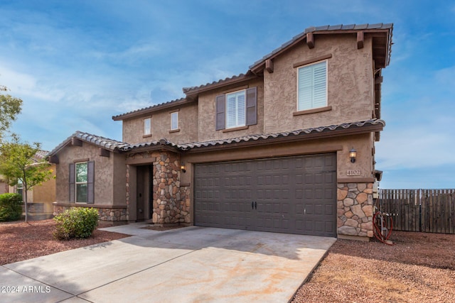 view of front of house with a garage