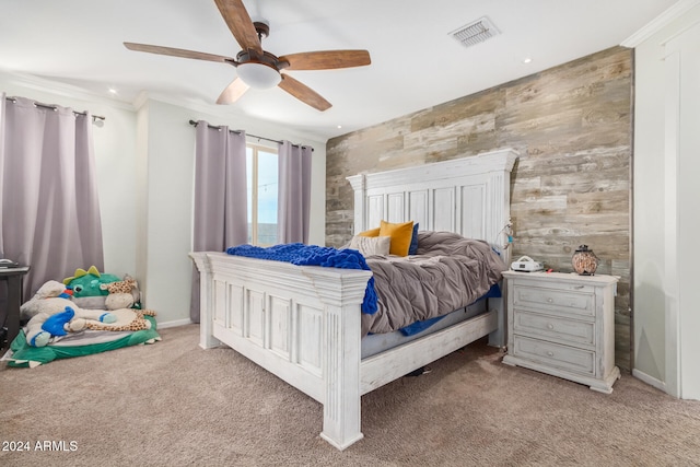 bedroom with carpet flooring, ceiling fan, and ornamental molding