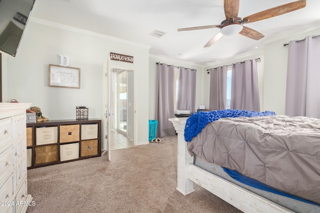 bedroom featuring light colored carpet, ceiling fan, and ornamental molding