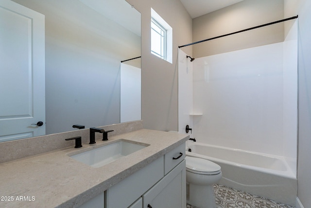 bathroom featuring shower / bathing tub combination, vanity, and toilet