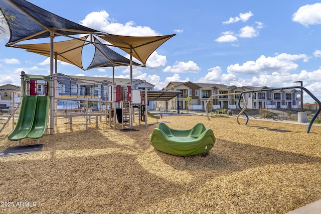 community play area with a residential view