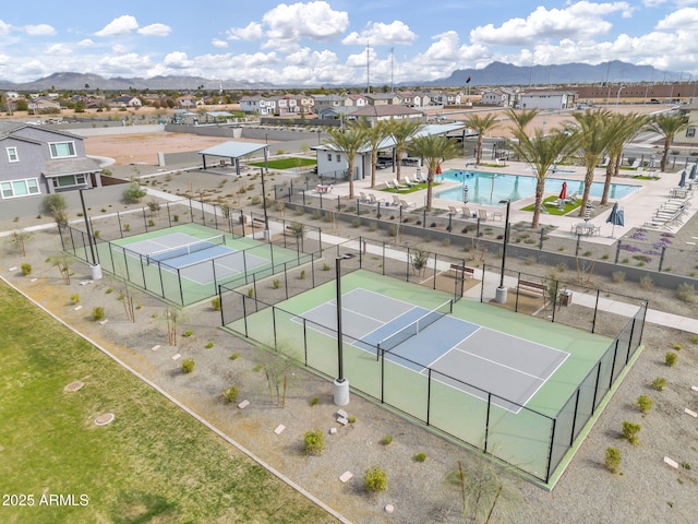 birds eye view of property featuring a residential view and a mountain view