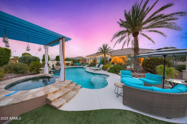 pool at dusk with an outdoor hangout area, a pergola, an in ground hot tub, and a patio