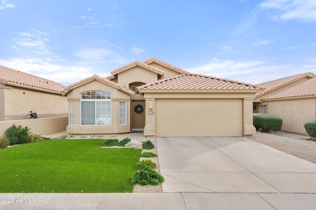 mediterranean / spanish-style house with a garage and a front lawn