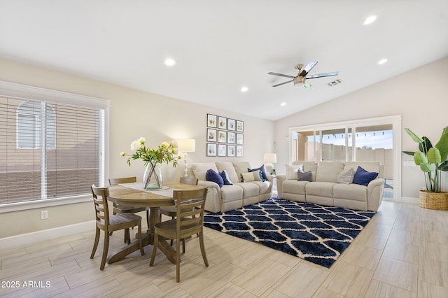 living room featuring lofted ceiling and ceiling fan