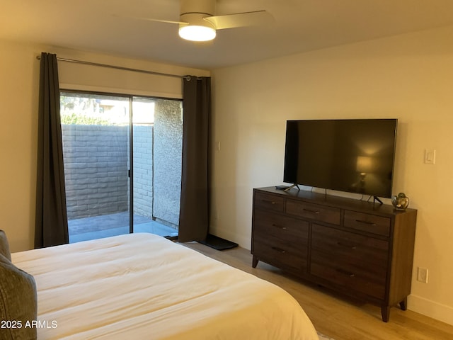 bedroom with access to exterior, ceiling fan, and light wood-type flooring