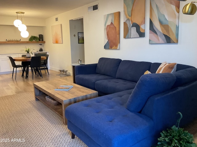 living room with light wood-type flooring