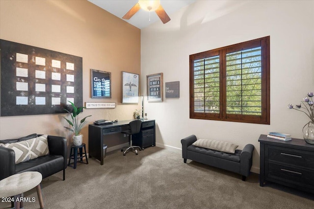 carpeted office with ceiling fan