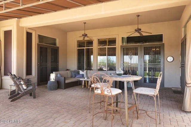 view of patio featuring outdoor lounge area and ceiling fan