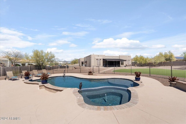 view of swimming pool featuring a patio area