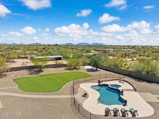 view of swimming pool featuring a mountain view