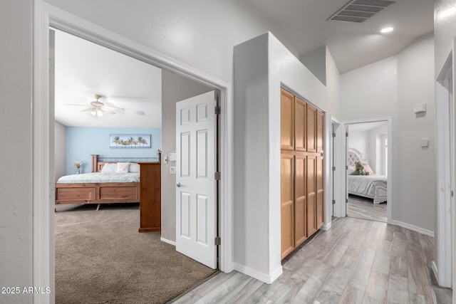 hallway featuring light hardwood / wood-style flooring