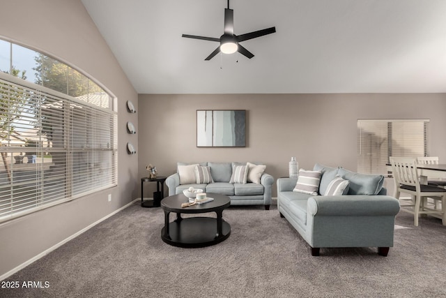 living room featuring lofted ceiling, carpet flooring, and ceiling fan