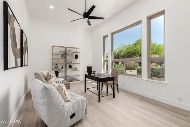 office with baseboards, light wood-type flooring, ceiling fan, and recessed lighting
