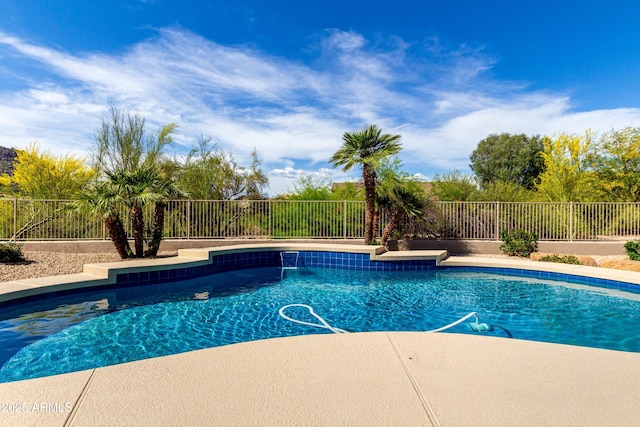 view of pool featuring a fenced backyard