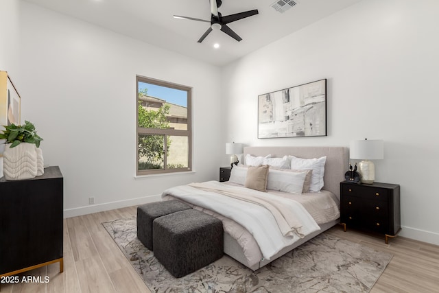 bedroom featuring light wood-style flooring, recessed lighting, baseboards, and ceiling fan