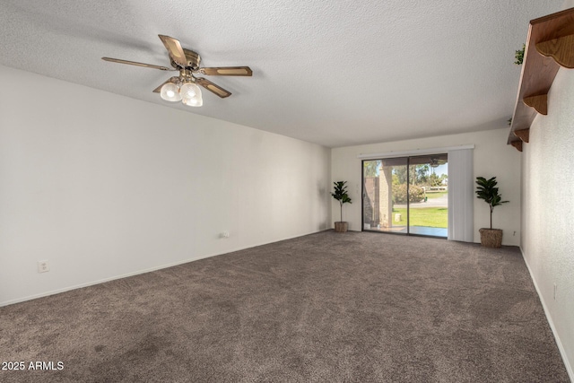 empty room featuring a textured ceiling, ceiling fan, and carpet