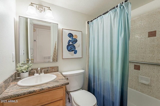 bathroom with toilet, vanity, and shower / bath combo with shower curtain