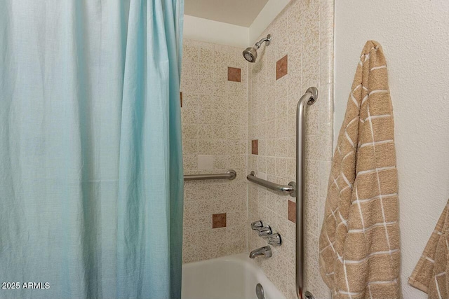 bathroom with shower / bath combo